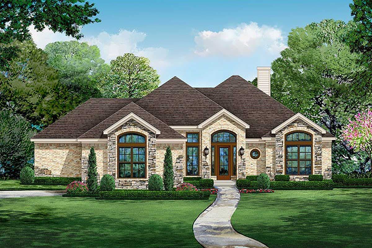 House plan exterior. One-story house in a traditional style with gabled roof, arched windows, and a stone facade with brick accents.