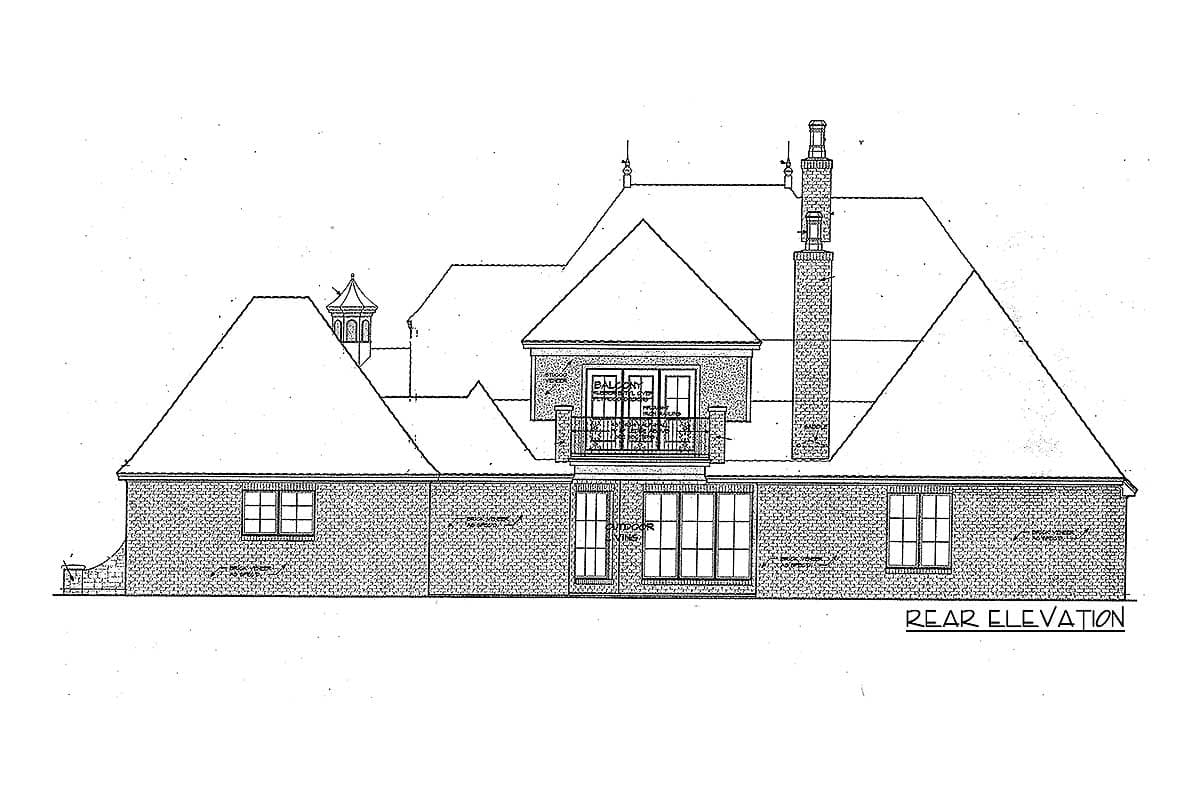 Rear elevation drawing of a house plan with multiple gables, a balcony, and a prominent chimney.
