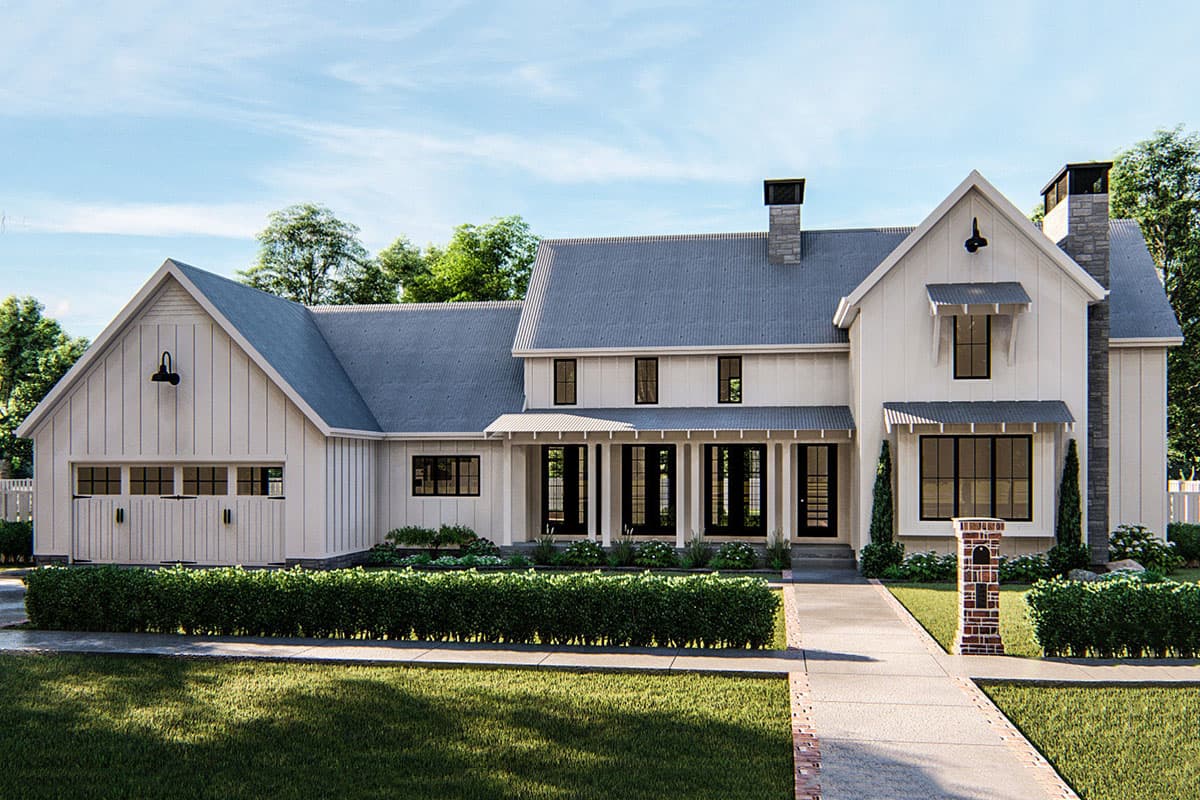 House plan exterior: Two-story Modern Farmhouse with gables, a covered porch, and a detached garage with barn-style doors. Stone chimney.