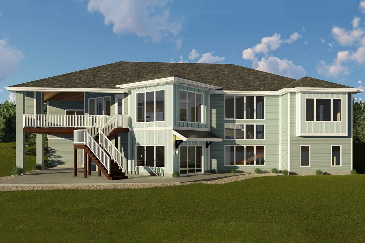 House plan exterior: Two-story modern design with extensive windows, a large elevated deck with dual staircases, and varied rooflines.