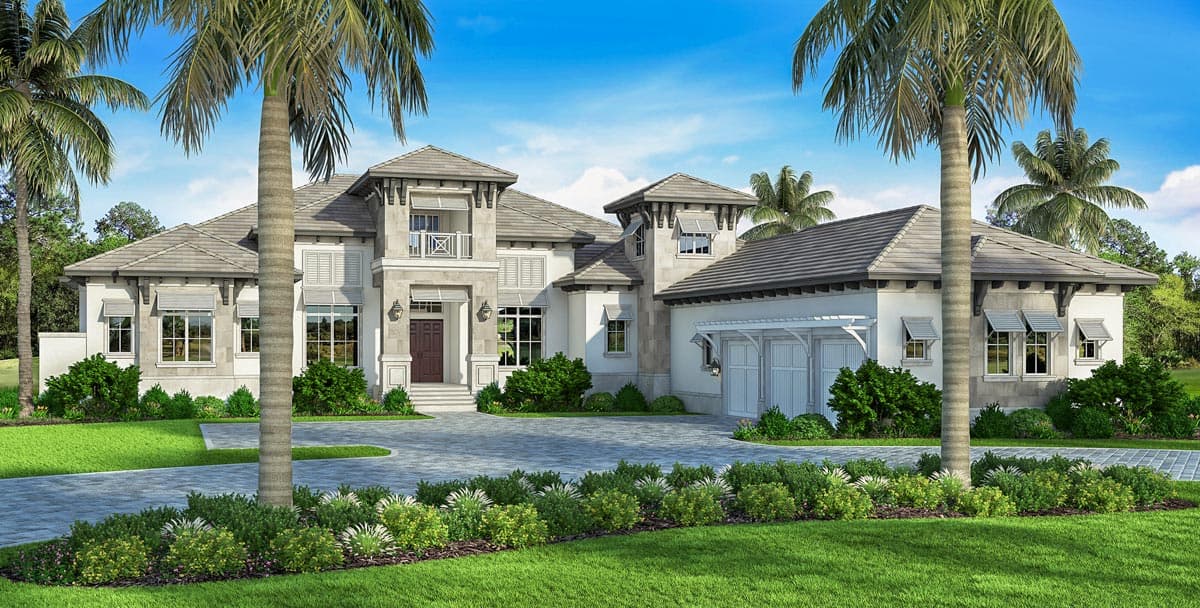 House plan exterior. Two-story Mediterranean style with a balcony, multiple gabled roofs, and an attached two-car garage.