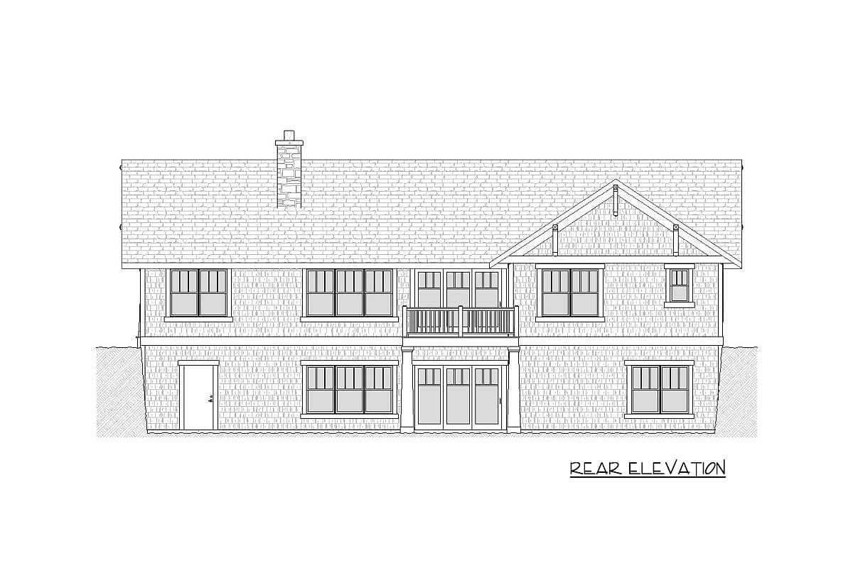 Rear elevation drawing of a two-story house plan with a prominent gable, chimney, and second-story balcony.