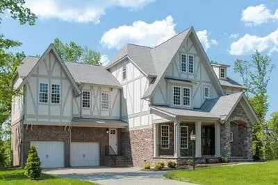Spacious Tudor House Plan - 4083 Sq Ft