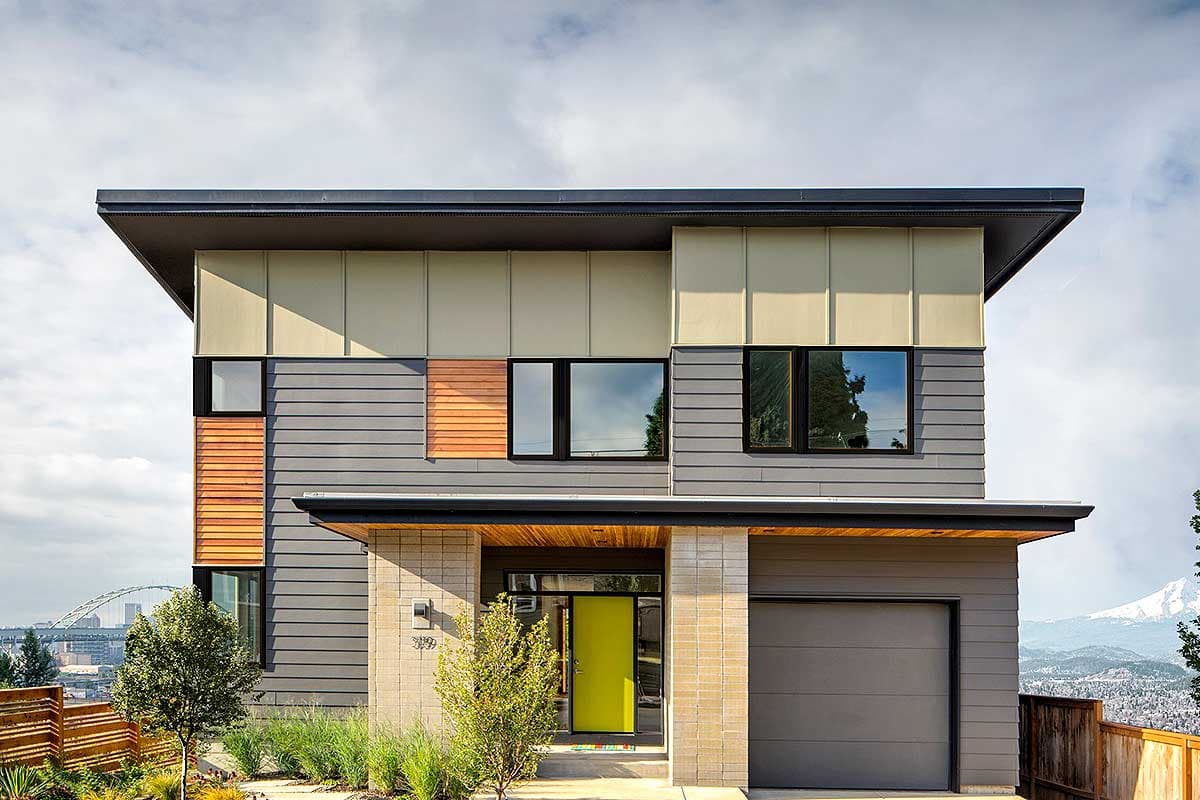 Modern two-story house plan exterior with layered siding, horizontal windows, prominent rooflines, and a striking lime green front door.
