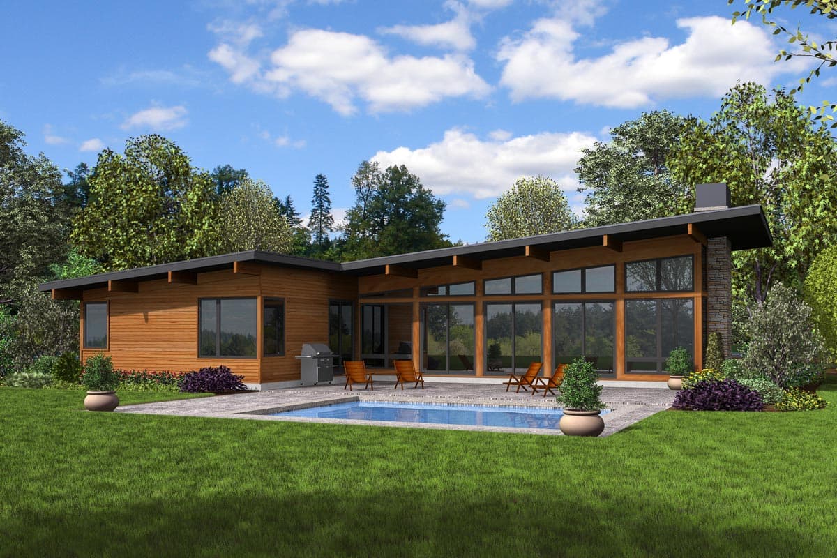 Modern house plan exterior with wood siding, a low-pitch roof, and extensive glass walls overlooking a pool.