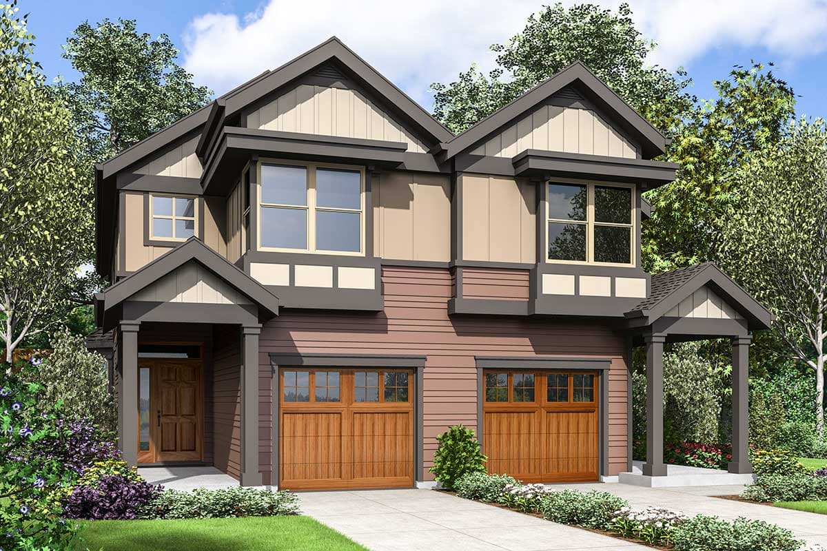 House plan exterior. Two-story Craftsman home with gabled rooflines, covered entry porch, and two-car garage. Features include bay windows.