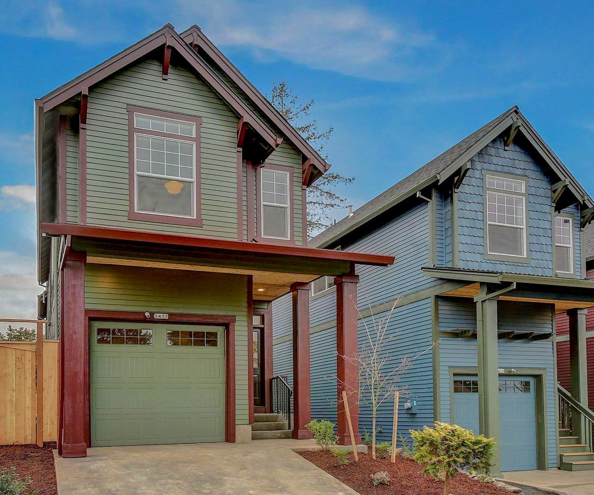 House plan exterior featuring Craftsman-style homes. Two stories with gabled roofs, front-entry garages, and covered porches supported by columns.