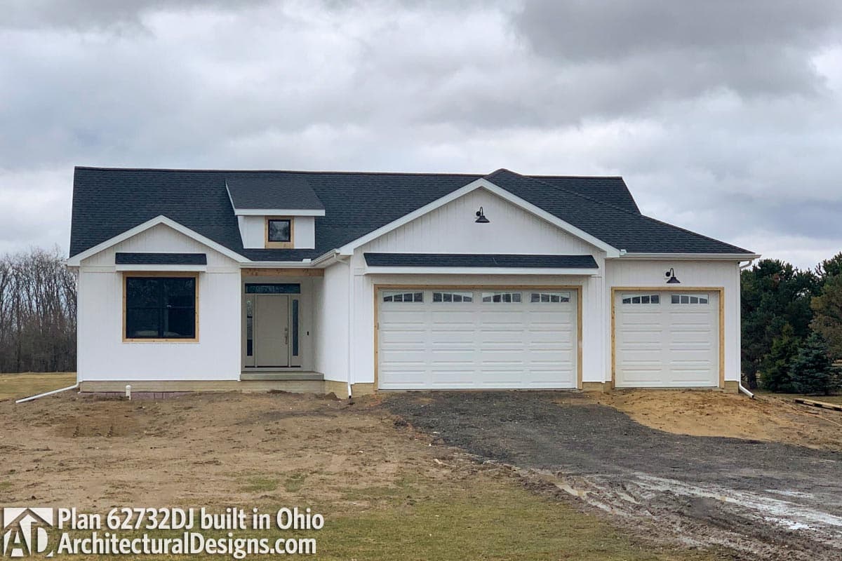Modern Farmhouse house plan exterior with a dormer, covered entry, and a three-car garage.