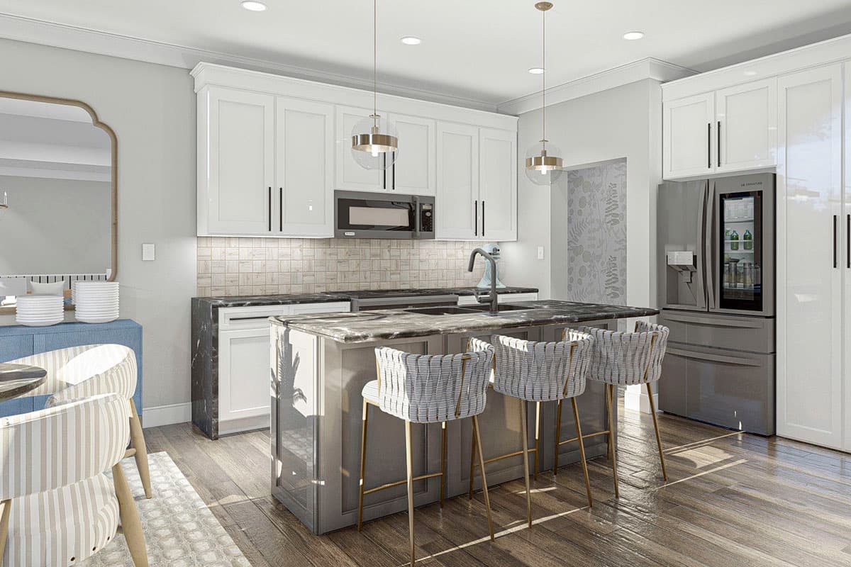 Kitchen with white cabinets, island with seating, stainless steel appliances, and wood flooring.