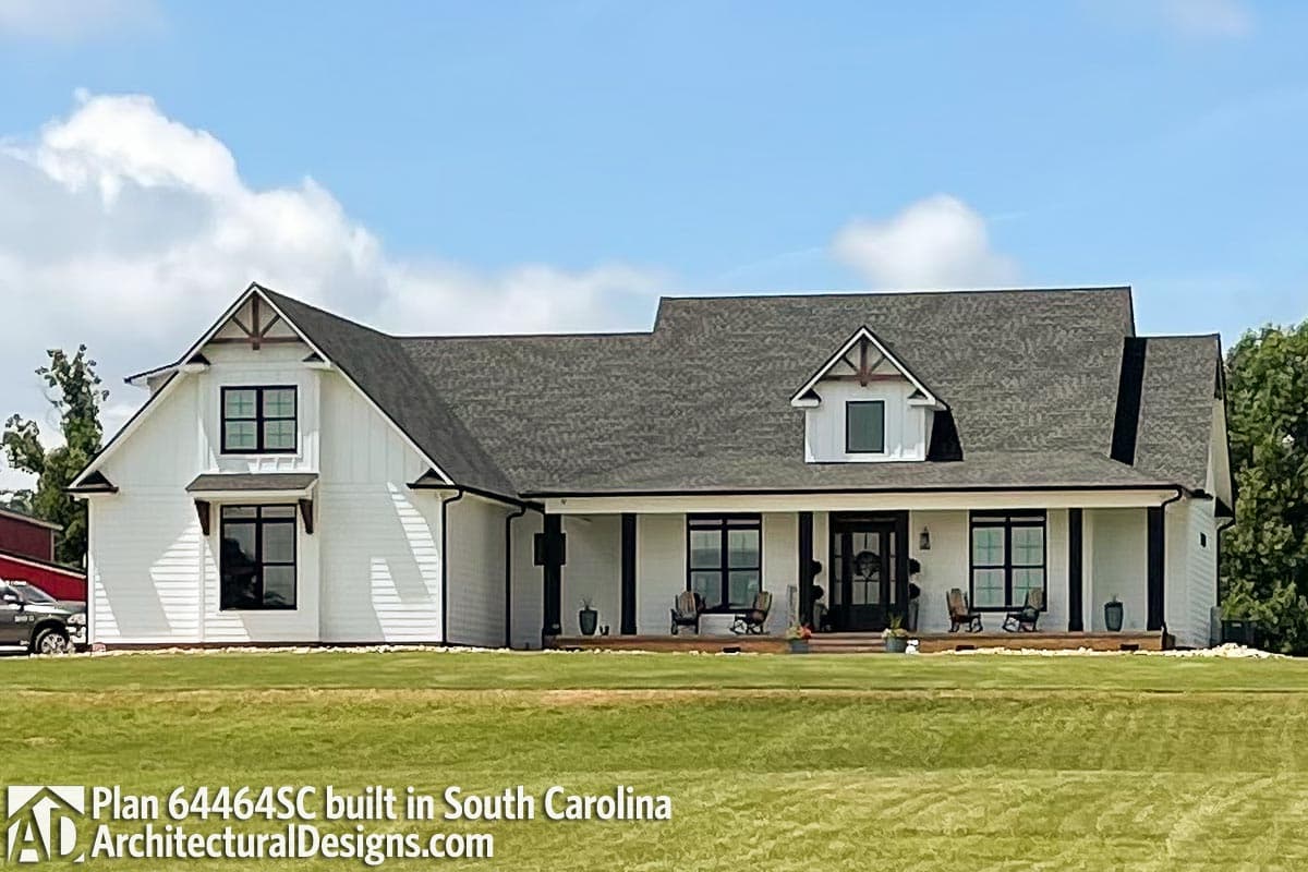 Modern farmhouse house plan exterior with a covered front porch, gables, and board and batten siding.