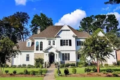 Luxury House Plan with Two Home Offices and a Covered Veranda 