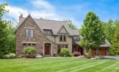 European House Plan with Tudor Influences