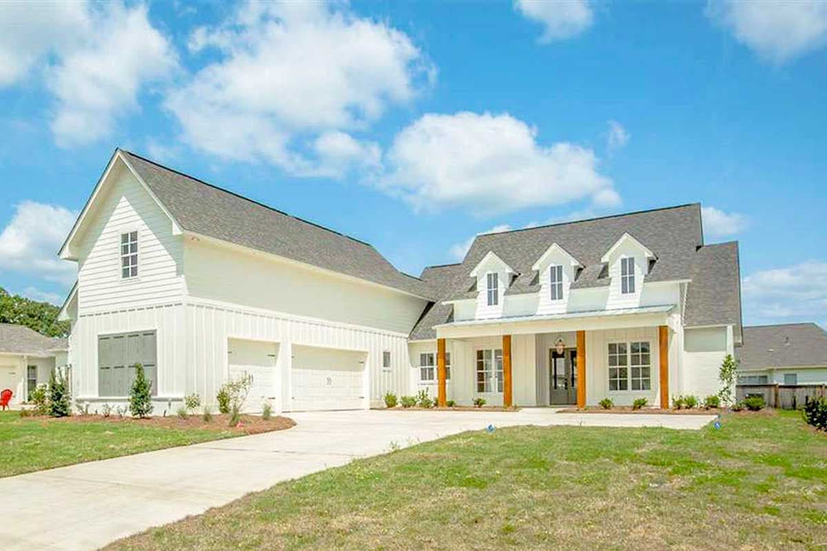 House plan exterior with Farmhouse style, two stories, gable roof, dormers, and front porch with exposed support beams.