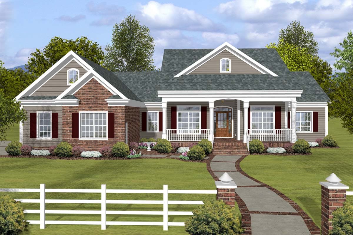 House plan exterior. Two-story, with brick facade, front porch with columns, and gabled roof. Includes a winding walkway and white picket fence.