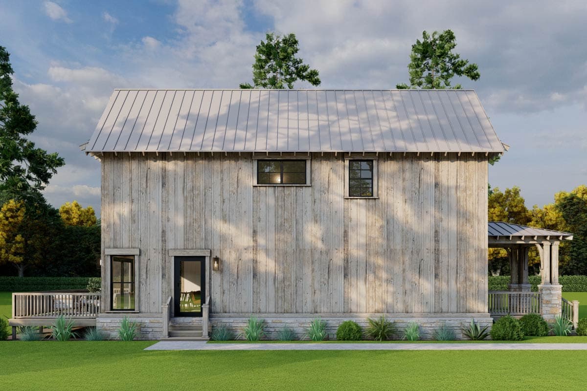 House plan exterior, two-story, metal roof, wood siding, stone foundation, deck, and covered porch.