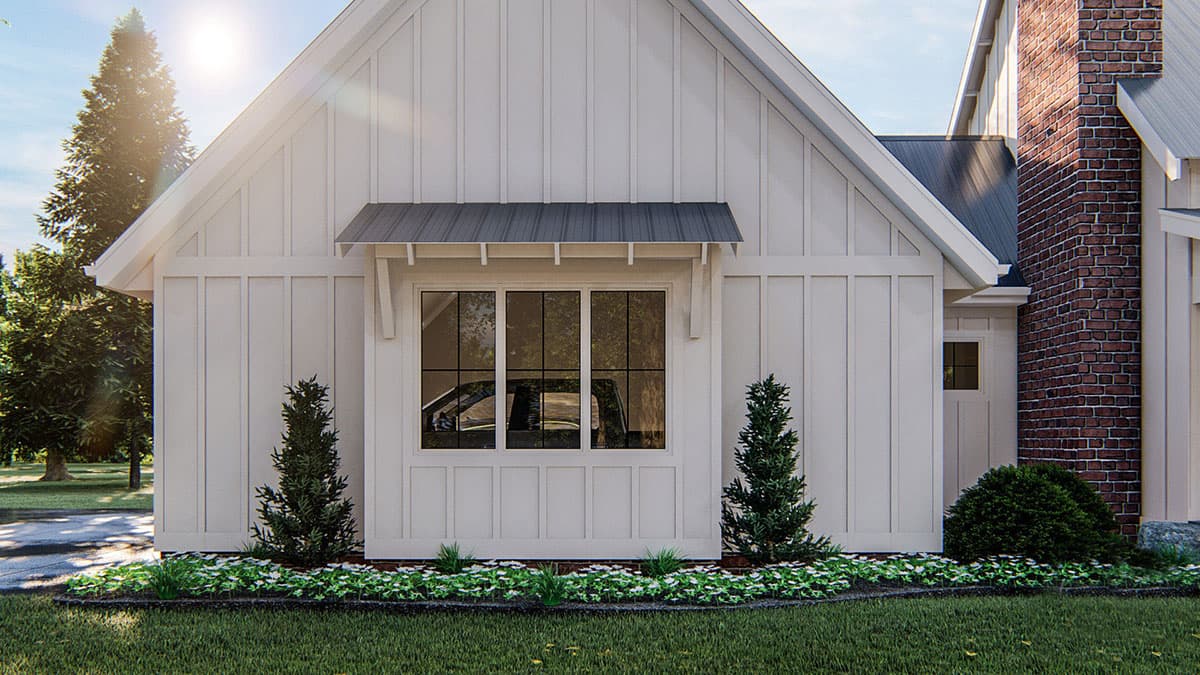 Modern Farmhouse house plan exterior with vertical siding, gable roof, metal awning over multi-pane window, and brick chimney.