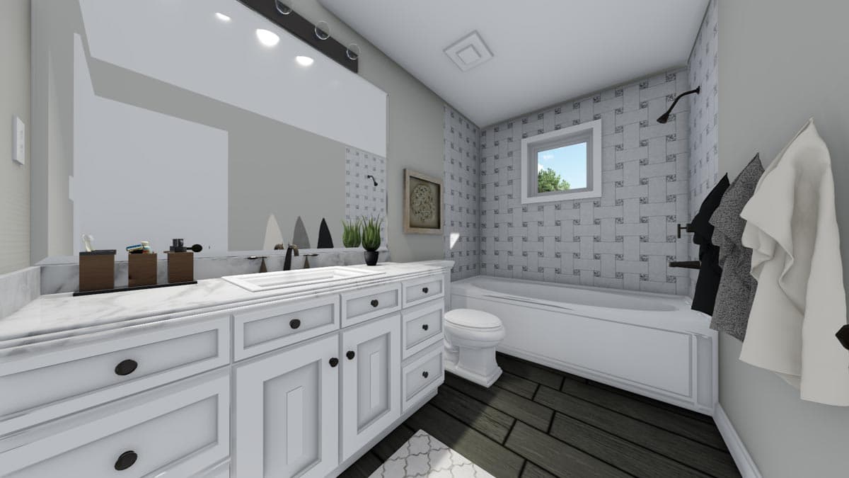 Bathroom interior with double vanity, tiled tub/shower surround, and dark wood plank flooring.