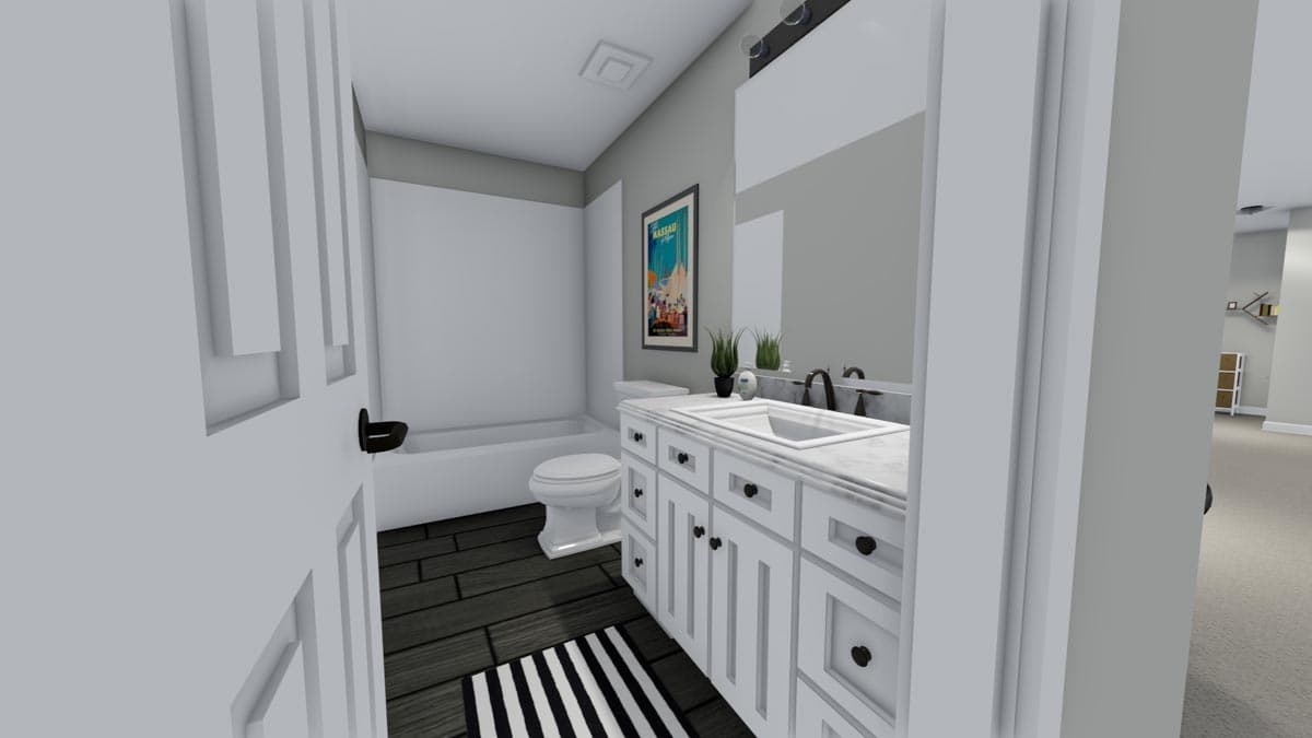 Bathroom interior with double vanity, white bathtub, toilet, and dark wood plank flooring.