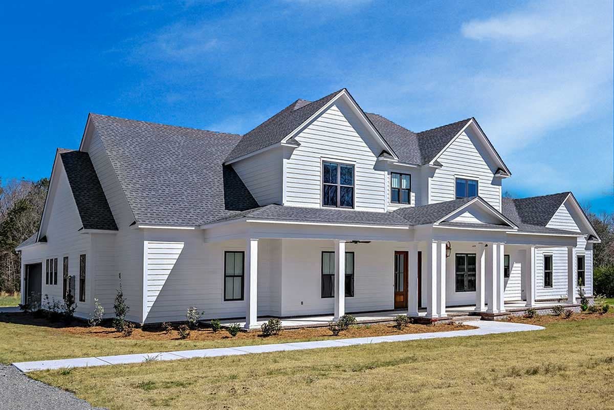 House plan exterior: Two-story Modern Farmhouse with a wraparound porch, multiple gables, and white horizontal siding.