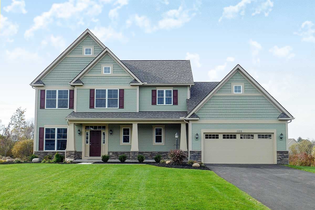 Two-story house plan exterior with gabled roof, covered porch, and attached garage. Featuring clapboard siding and decorative shutters.