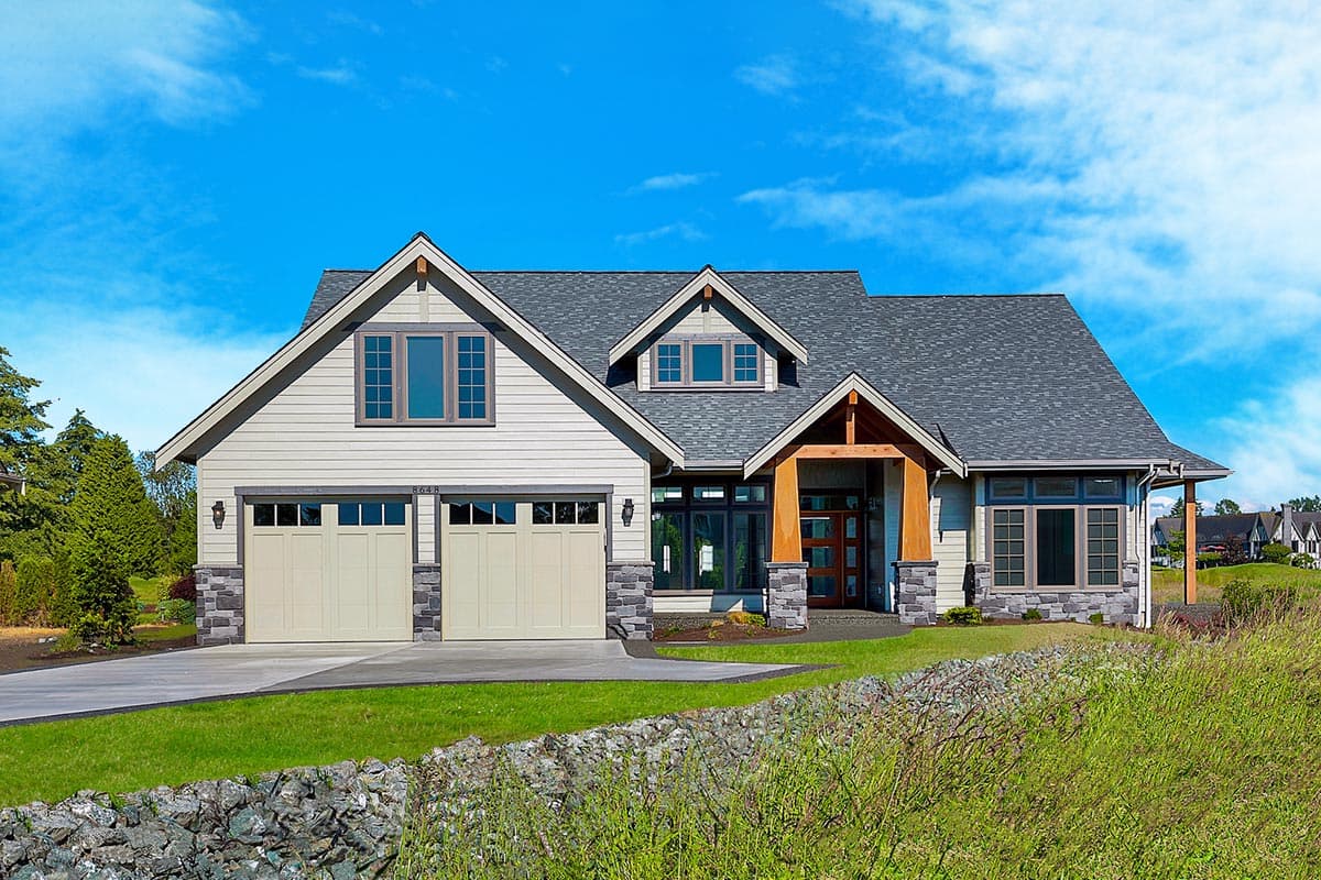 House plan exterior. Two-story Craftsman home with gabled roof, stone accents, and a covered front entry porch. Two-car garage.