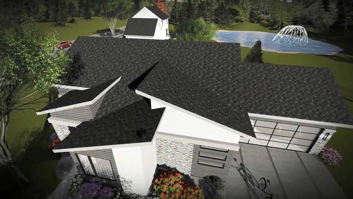 House plan exterior with multi-level rooflines, stone accents, and a large garage door.
