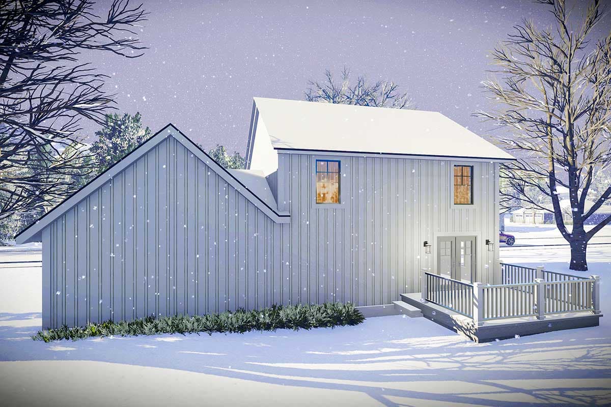Modern Farmhouse style house plan exterior with vertical siding, gable roof, deck, and double doors in winter snowfall.