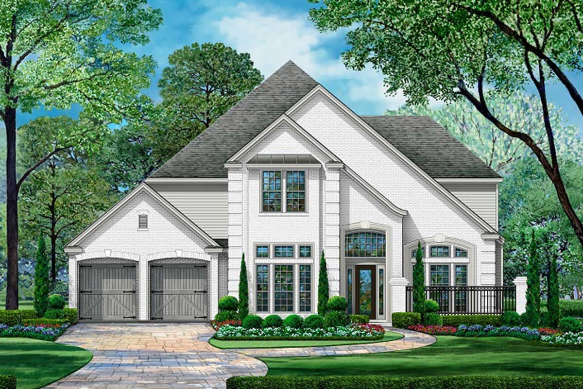 House plan exterior. Two-story home with brick facade, front-facing gables, arched entry, and a two-car garage with carriage-style doors.
