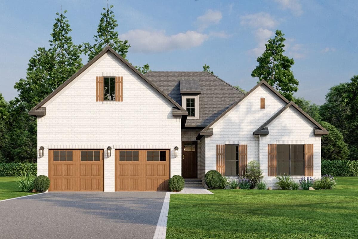 House plan exterior with two stories, a gabled roof, brick facade, and wood shutters. The house has a two-car garage with wood doors.