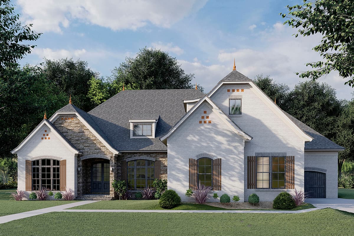 House plan exterior. Two-story home with a stone facade, gabled roof, arched windows, and a side-entry garage.