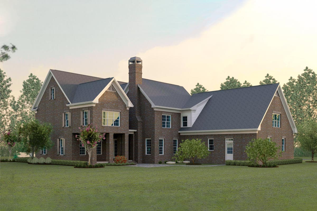 House plan exterior: Two-story brick home with multiple gables, prominent chimney, and covered porch.