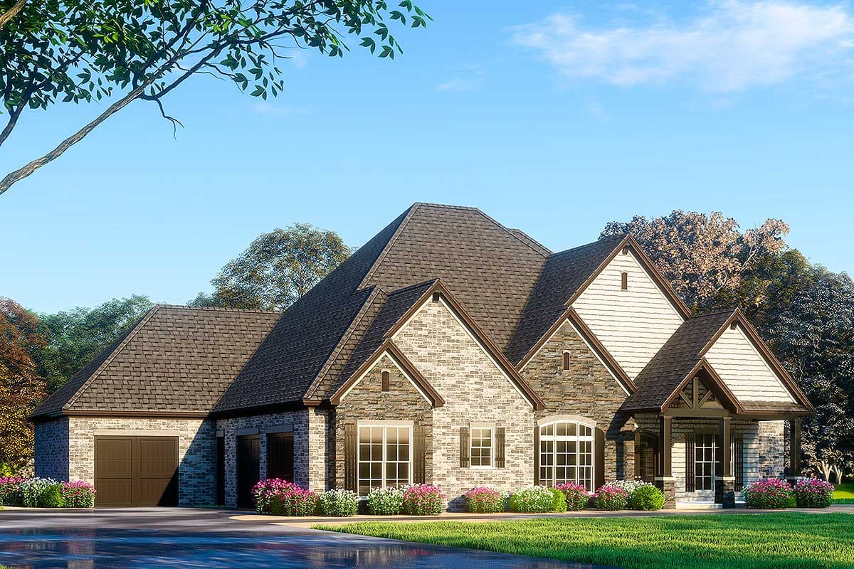 House plan exterior. Two-story home with stone and shingle siding, multiple gabled rooflines, a covered entry porch, and an attached garage.