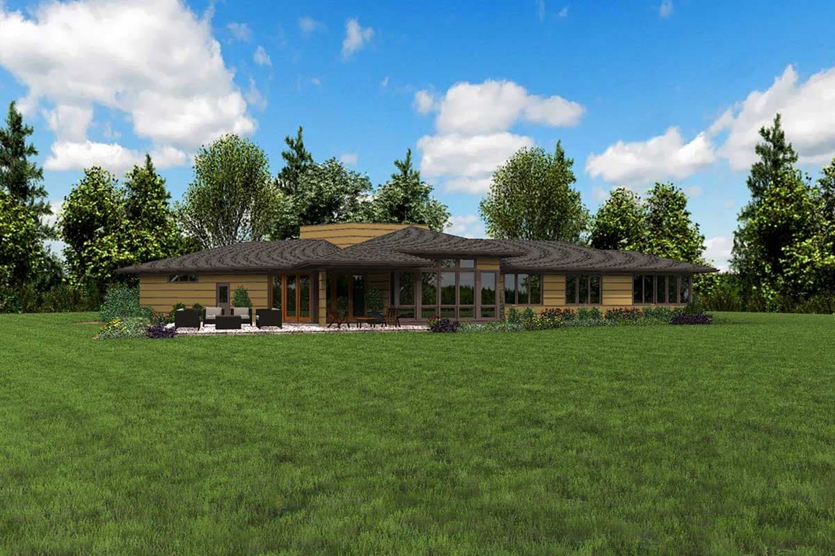 House plan exterior: Ranch style, single story, with wide eaves, multiple gables, and large windows.