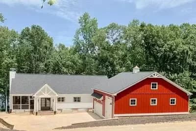 Exclusive Craftsman Ranch Home Plan with Barndominium Car Studio