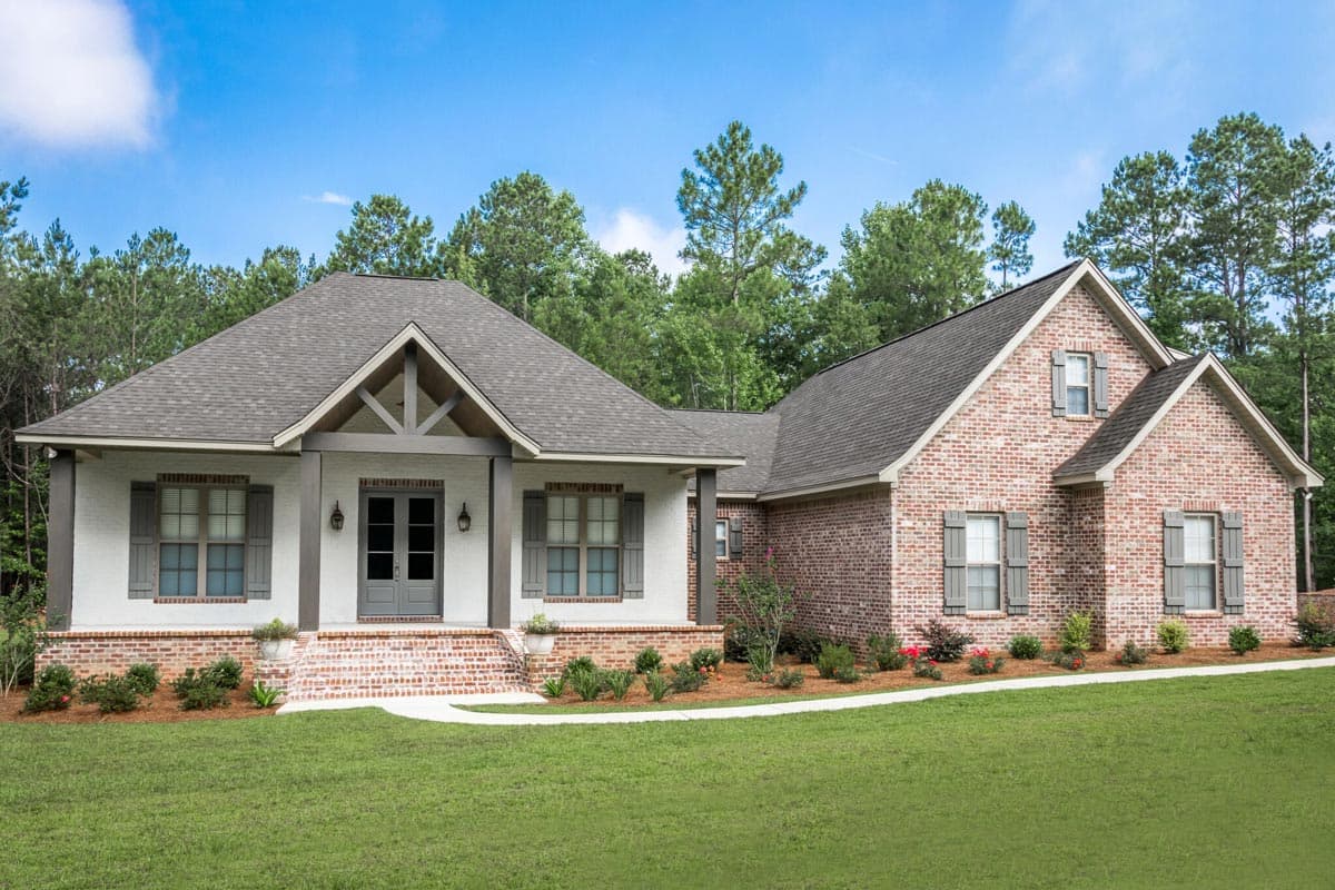 House plan exterior with two stories and brick and white siding. Features include a front porch, gables, and gray rooflines.