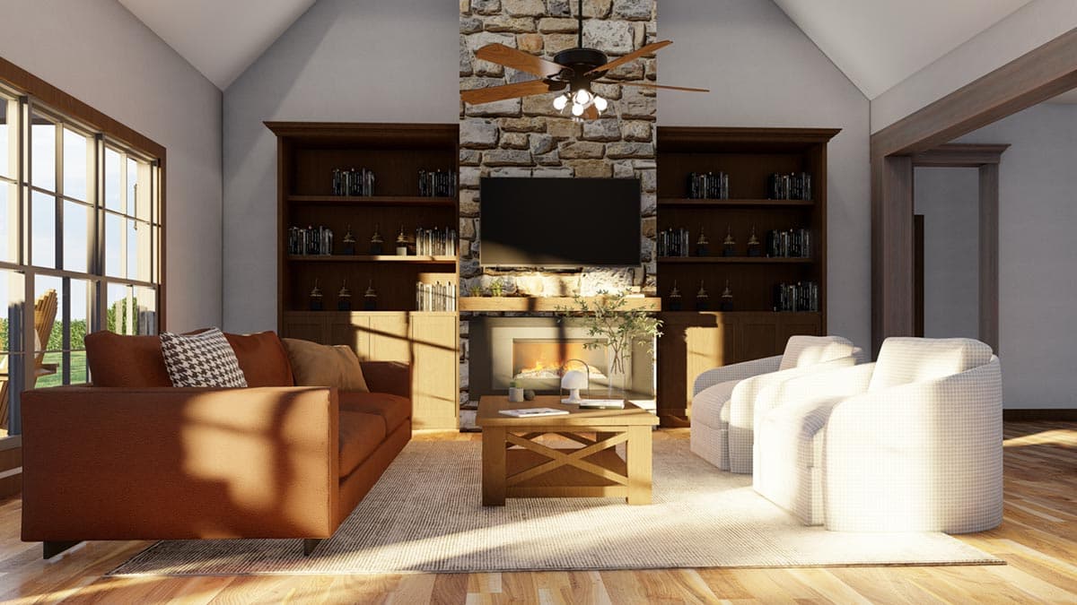 Great room with vaulted ceiling, stone fireplace, built-in bookcases, large windows, and wood floors.
