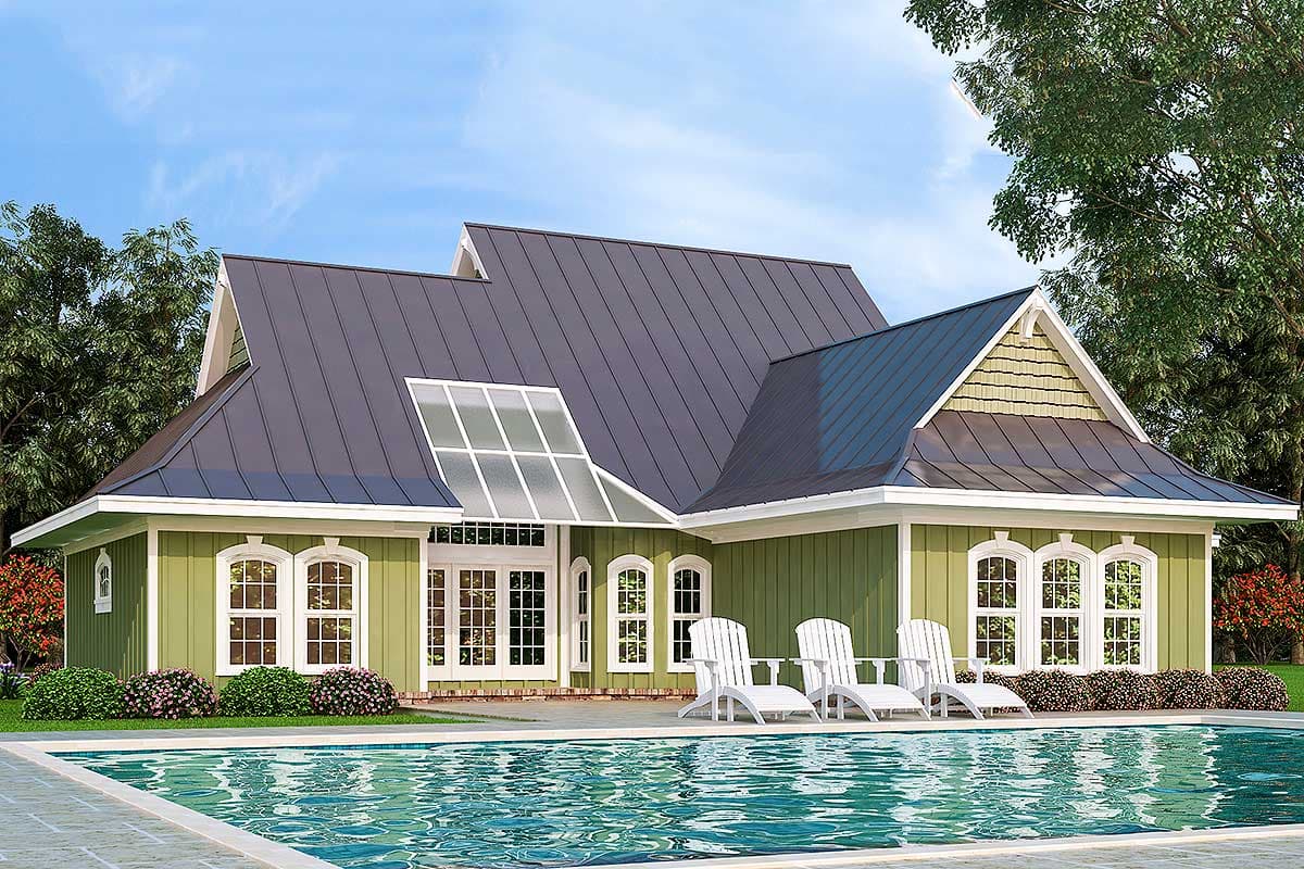 House plan exterior: green siding, gambrel roof, arched windows, metal roof, gable with shake siding, and a sunroom.