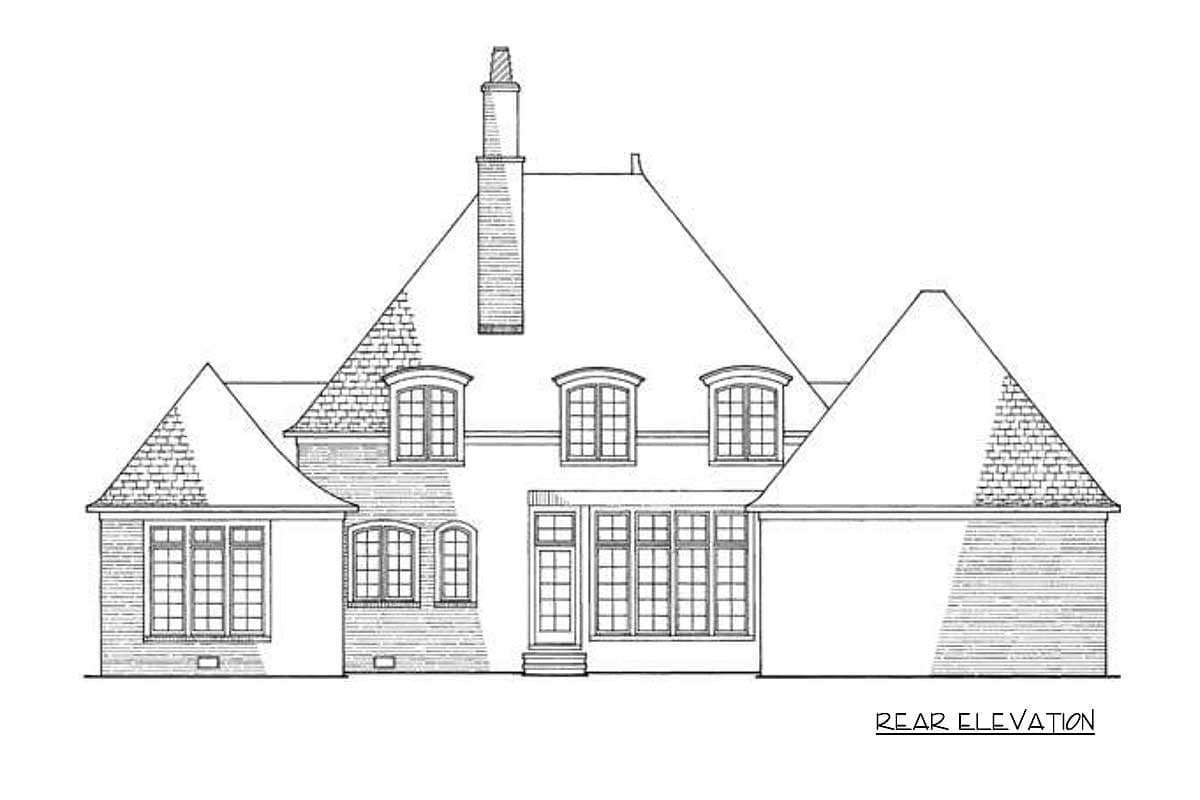 Rear elevation of a house plan featuring a prominent chimney, multiple gables, and numerous arched and rectangular windows.