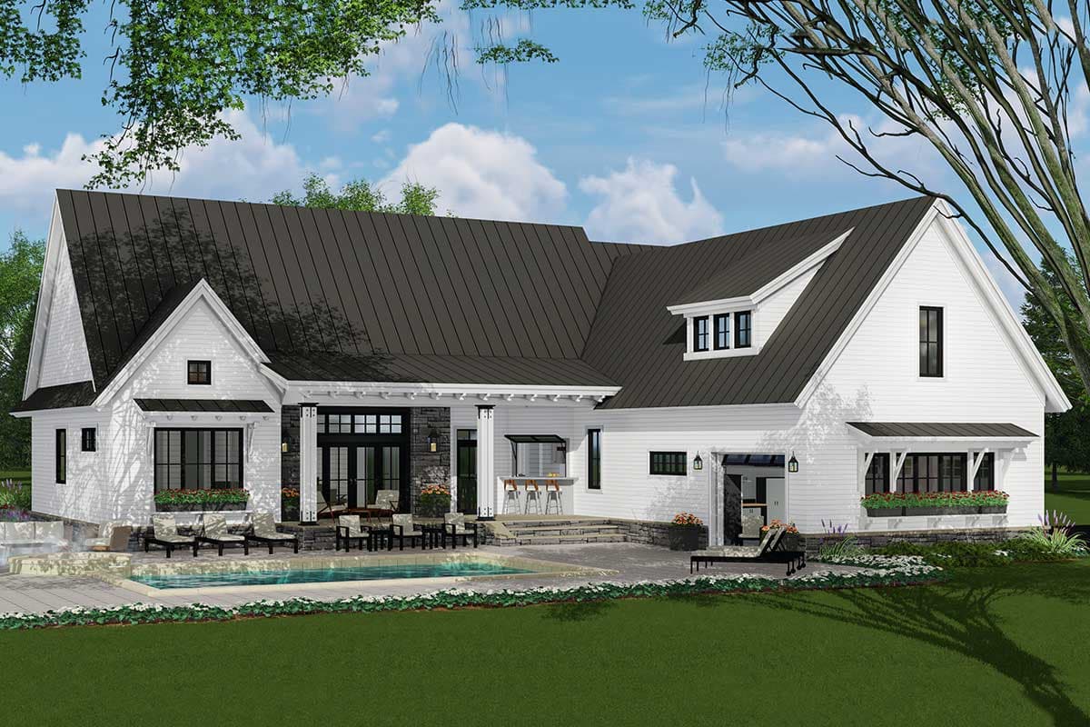 Modern Farmhouse house plan exterior with metal roof, dormers, covered porch, and attached garage.