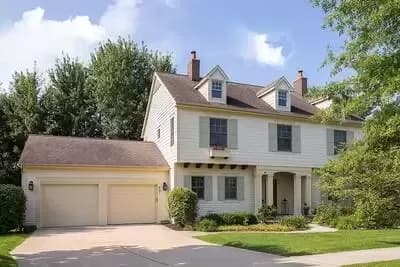 4-Bedroom Traditional Home Plan with Den and Open-Concept Main Floor