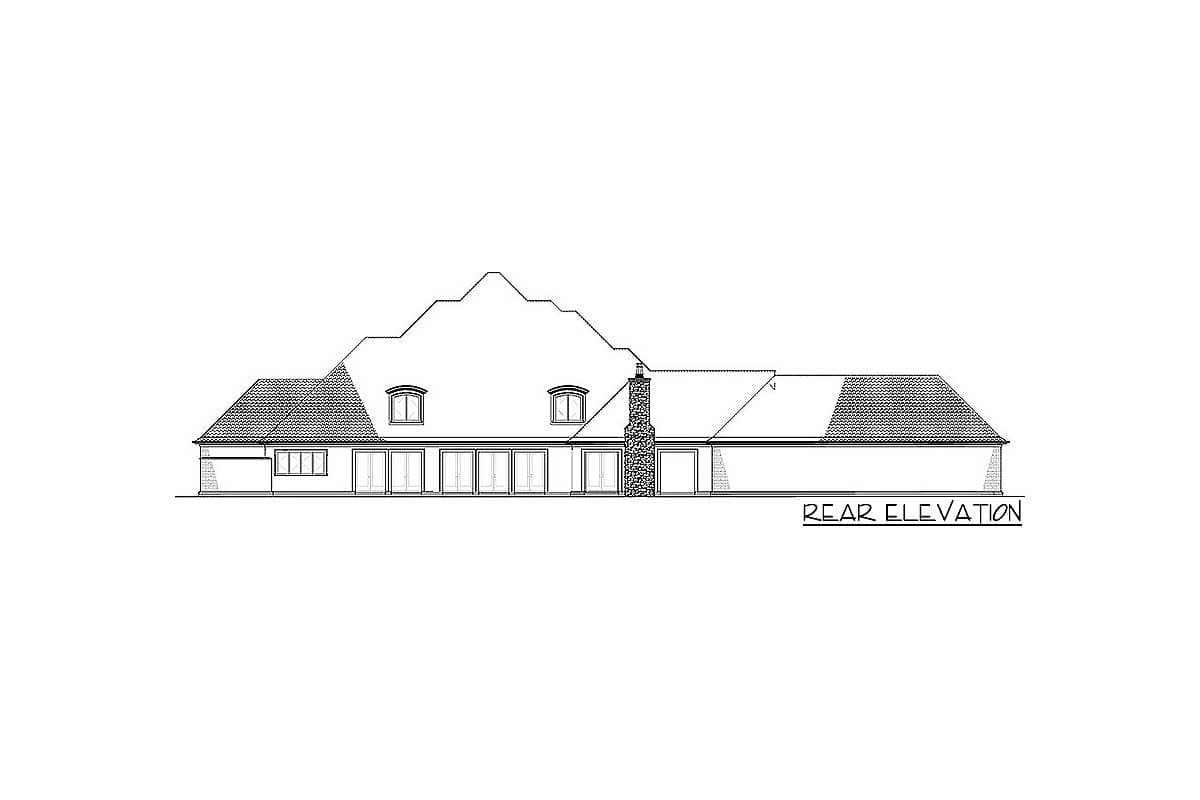 Rear elevation drawing of a house plan featuring a complex roofline, dormers, multiple windows, and a stone chimney.