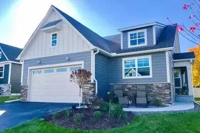 Exclusive Modestly-Sized Craftsman Home Plan with Innovative Front Door