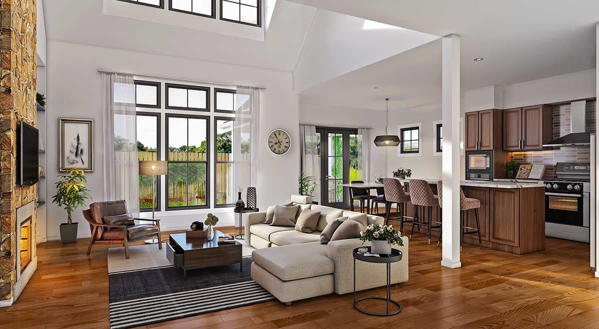 Open-concept living area and kitchen with vaulted ceiling, stone fireplace, large windows, and island.