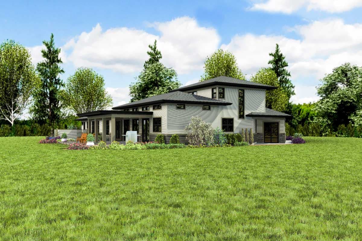 Modern house plan exterior with multiple gables, a covered porch, and a two-car garage.
