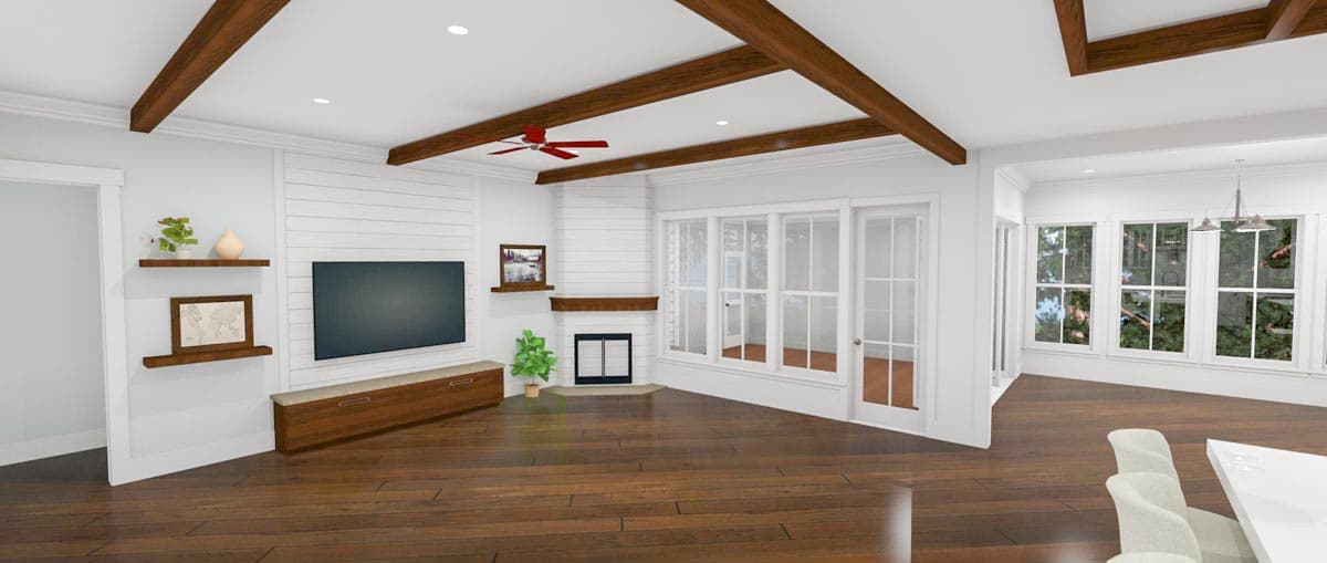Living room with shiplap walls, fireplace, wood beams on ceiling, and large windows.