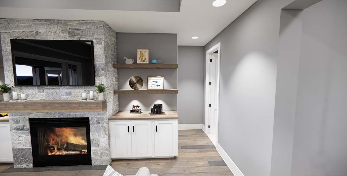 Interior rendering of a living area featuring a stone fireplace, wooden mantle, built-in shelving, and an open doorway.