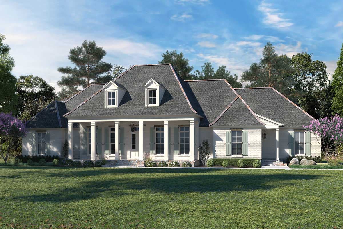 House plan exterior. One-story house with a porch supported by columns, multiple gables, dormers, and a brick exterior.