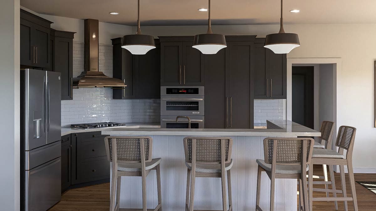 Kitchen with dark cabinetry, stainless steel appliances, subway tile backsplash, and a breakfast bar with seating.