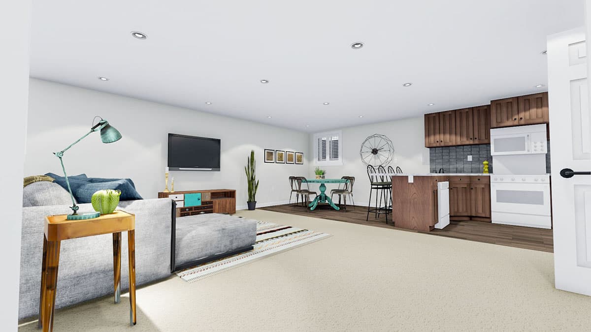 Open concept living, dining, and kitchen area with island, bar stools, and full-size appliances.