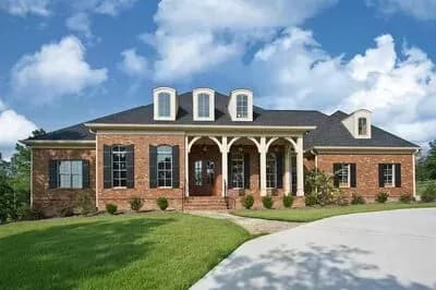 Classic House Plan with Elegant Brick Exterior and Bonus Over Garage